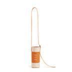 Crossbody Bottle Bag in Cognac
