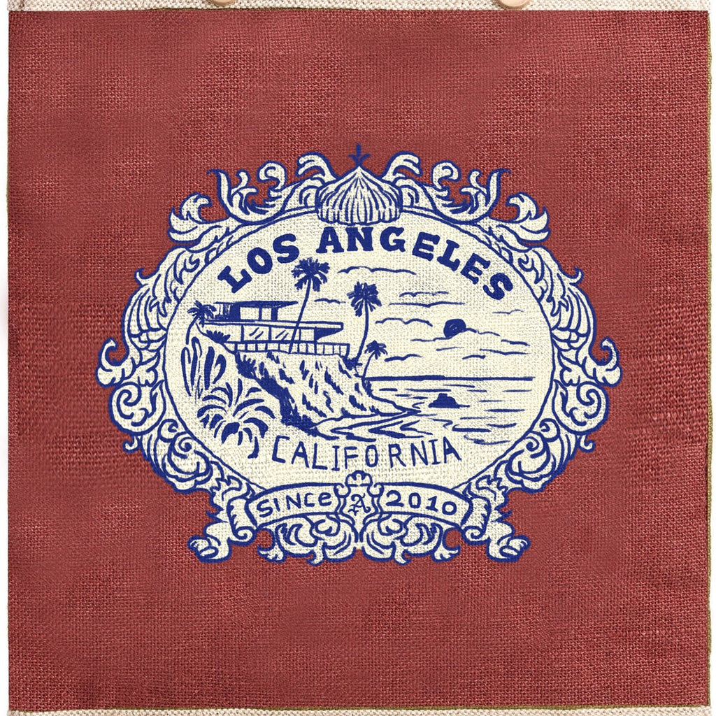 Market Bag in Cranberry — Los Angeles Badge, close-up of the Los Angeles badge print
